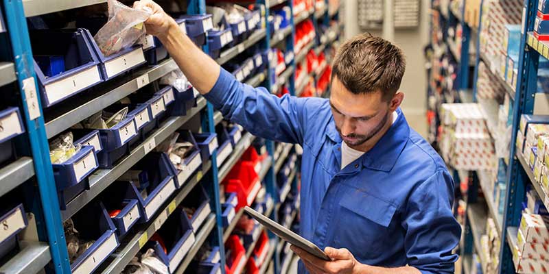 Mechanic getting parts in store